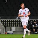 Dean Lewington made his long-awaited return to first-team action on Tuesday night after missing much of pre-season with a hamstring issue. Pic: Jane Russell