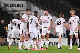 MK Dons celebrate after scoring their third against Chelsea U21s on Tuesday night Pic: Jane Russell
