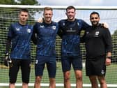 The MK Dons goalkeeping unit - Ronnie Sandford, Craig MacGillivray, Nathan Harness and coach Erbil Bozkurt