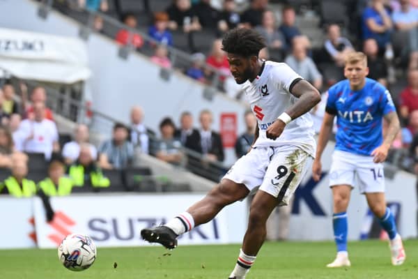 Ellis Harrison could make his first start for MK Dons this evening against Oxford United