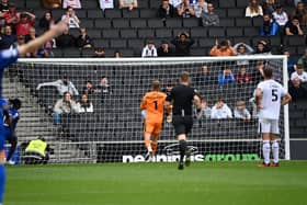 Craig MacGillivray’s clearance off the back of Warren O’Hora saw the ball fly into MK Dons’ net - the only goal of the game against Harrogate