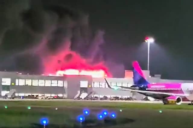 All flights suspended from Luton Airport after huge blaze rips through car park. (Photo: Ahmad Hassan Bobak/PA Wire)