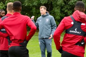 Mike Williamson addresses his players in training
