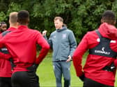 Mike Williamson addresses his players in training