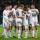 MK Dons celebrate Jack Payne’s goal against Bradford City