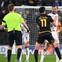 Alex Gilliead takes on Alex Gilbey during Bradford’s defeat to MK Dons on Tuesday