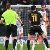 Alex Gilliead takes on Alex Gilbey during Bradford’s defeat to MK Dons on Tuesday