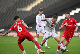 Jack Payne dances through the Swindon midfield