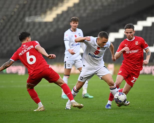 Jack Payne dances through the Swindon midfield