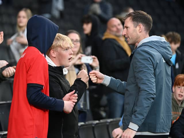Mike Williamson met some of the MK Dons fans, and posed for pictures, after Saturday’s win over Swindon Town
