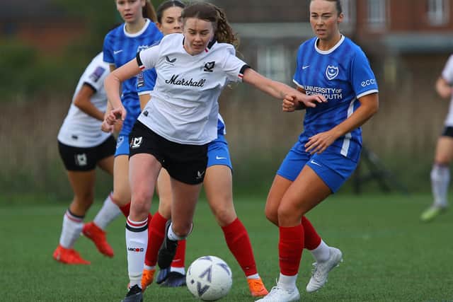 Emily Wilson battles through the midfield against Portsmouth. Pic: CTF Photography