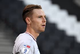 Dan Kemp will return to MK Dons after being recalled from his loan at Swindon Town