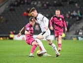 Conor Grant in action for MK Dons in the win over Forest Green Rovers
