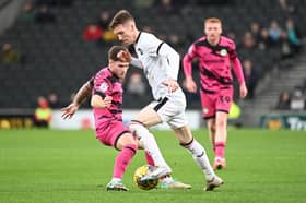 Conor Grant in action for MK Dons in the win over Forest Green Rovers