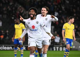 Ellis Harrison celebrates scoring the winner against Colchester United