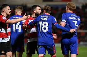 It was a disappointing start to the year at Doncaster for MK Dons. Here's how we rated the players
