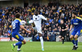 Mo Eisa in action against AFC Wimbledon when the sides last met in April 2022