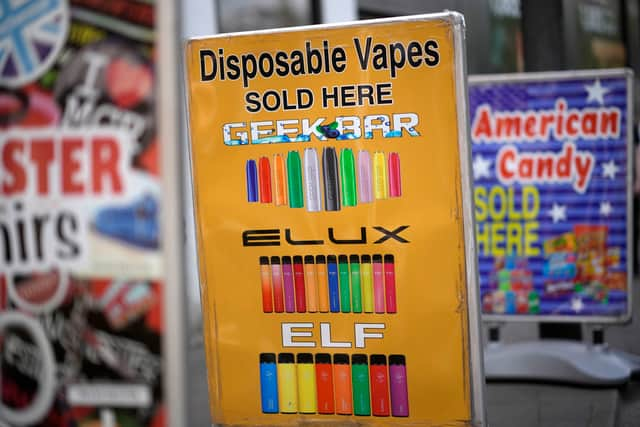 Advertising boards promote vaping devices outside a shop in Manchester (Photo: Christopher Furlong/Getty Images)