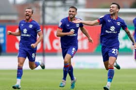 MK Dons were 5-3 winners over Wrexham on the opening day of the season