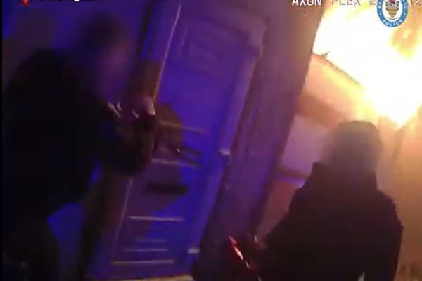 An arson in Villa Road, Lozells, Birmingham, saw officers help two people to safety.
Firearms officers who were out on patrol were the first on the scene after spotting the fire just before midnight on Sunday.
After alerting the fire service, officers entered the next-door building and led the occupants to safety.