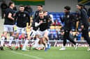 MK Dons during warm-up