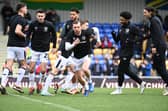 MK Dons during warm-up