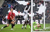 Matt Smith diverted Emre Tezgel's header into his own net, but still made the League Two team of the Week