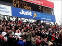 Celebrations at the full-time whistle after MK Dons secured promotion from League Two