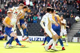 David Wheeler scored the only goal of the game last time Dons played Mansfield at Stadium MK