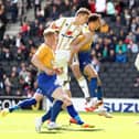 David Wheeler scored the only goal of the game last time Dons played Mansfield at Stadium MK