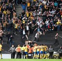 Mansfield celebrate with their travelling support