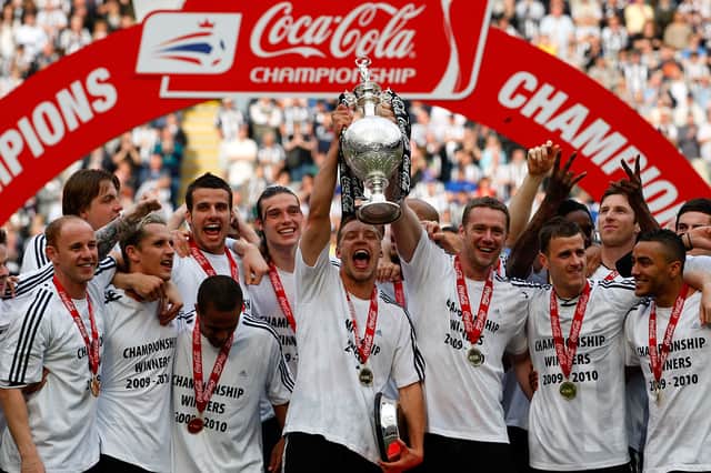 Alan Smith (centre) and Mike Williamson (back right) were part of the Newcastle team which won the Championship in 2010