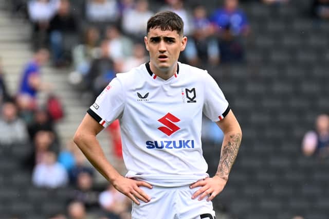 Devoy not sure of his Dons future as Swindon boss makes play to keep him