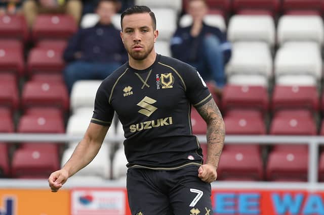 Samir Carruthers made more than 100 appearances for MK Dons