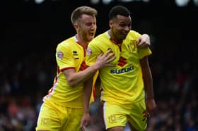 Josh Murphy celebrates scoring against Fulham with MK Dons team-mate Dean Bowditch