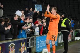 Filip Marschall with MK Dons supporters