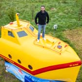 A lifeboat found floating in the sea has been turned into a real-life Yellow Submarine for glamping. 
