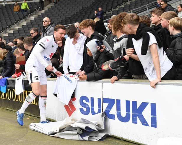 The players and staff lapped the Stadium MK pitch to sign and pose for pictures with supporters after the game.
Here are a selection of the pictures from Jane Russell