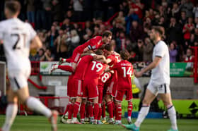 Crawley Town celebrate as they thump MK Dons 3-0 at Broadfield Stadium. Pic: Eva Gilbert