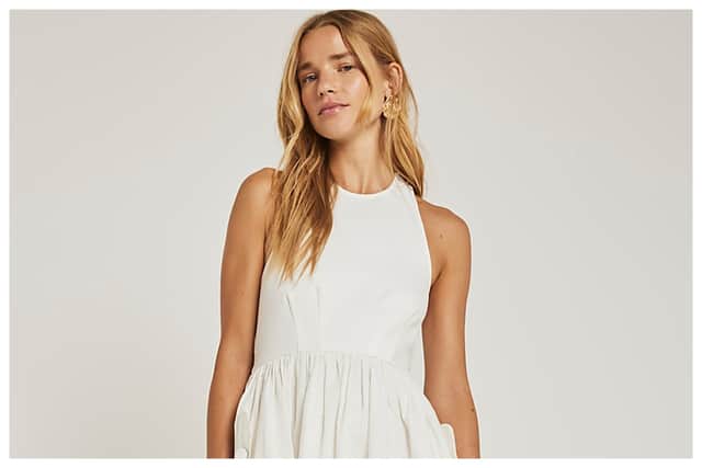 This River Island White Open Back Halter Neck Slip Mini Dress, £40, is incredibly versatile