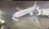 Plane blown away from airport gate by ferocious 80mph winds.
