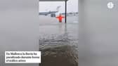Mallorca airport flooding sees high flood water on runway.