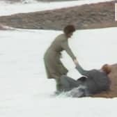 Neil Kinnock falls over on Brighton seafront in 1983.