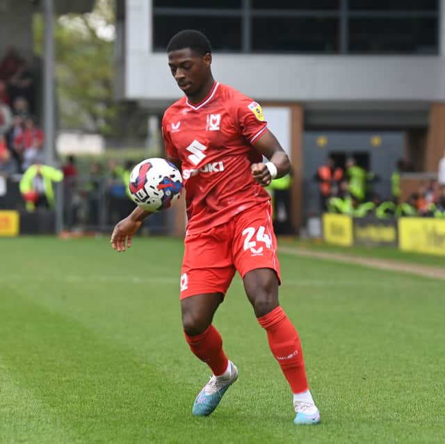 Sullay Kaikai in action against Burton on the final day of the season in 2023 - the game which saw Dons relegated