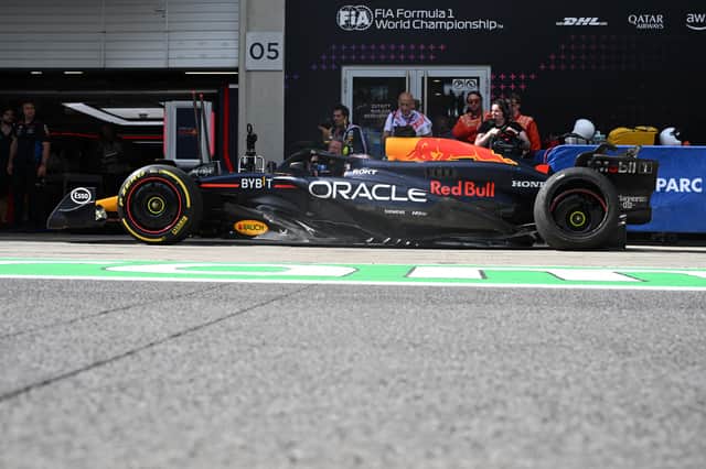 Verstappen's Red Bull limped back to the pits with a puncture after crashing with Norris' McLaren