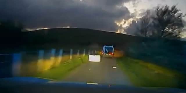 Passenger hurls freezer from van door during police chase in South Wales.