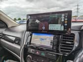 The Carpuride W103 sits on top of your dashboard, or on the windscreen, and gives you full access to Android Auto or Apple CarPlay