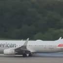 Boeing 737’s tyre explodes, flinging rubber across the runway.