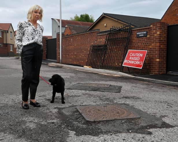  Residents have blasted developers after paying £550,000 to live on 'desolate' newbuild estate which remains unfinished - FIVE years after people moved in. Pictured: Lin Glover