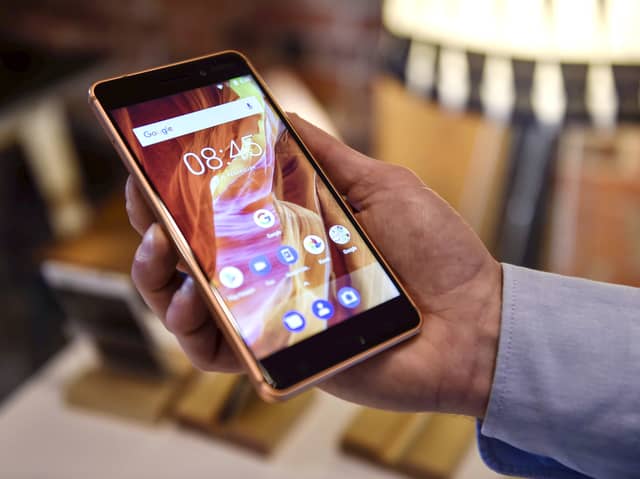 Hidden features you didn't know your Android phone could do. Photo: Emmi Korhonen/AFP via Getty Images